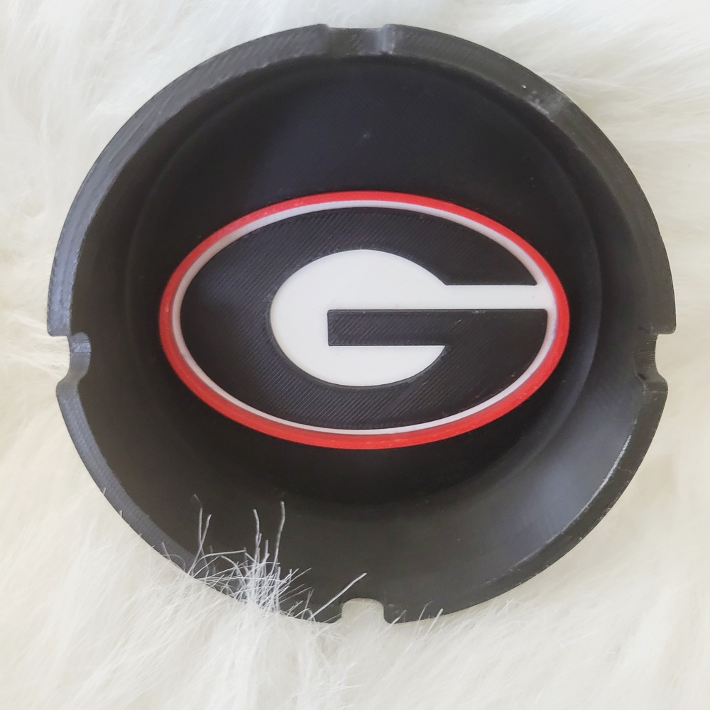 Black Ashtray with Red and White Logo